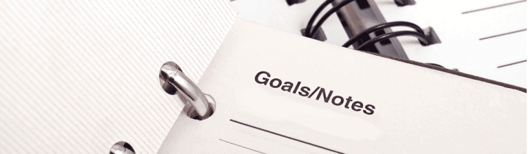 Flexible virtual office workspace with goal-setting notes and planners for remote business solutions.