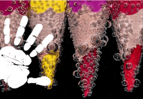 Graphic with a black background that has a row of colored pencils plunging downwards into water. Bubbles can be seen on the pencils. A white hand print has been placed to the side on top of the image.