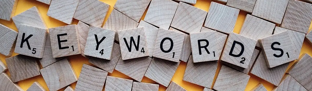 Scrabble letters spell out the word Keyworeds